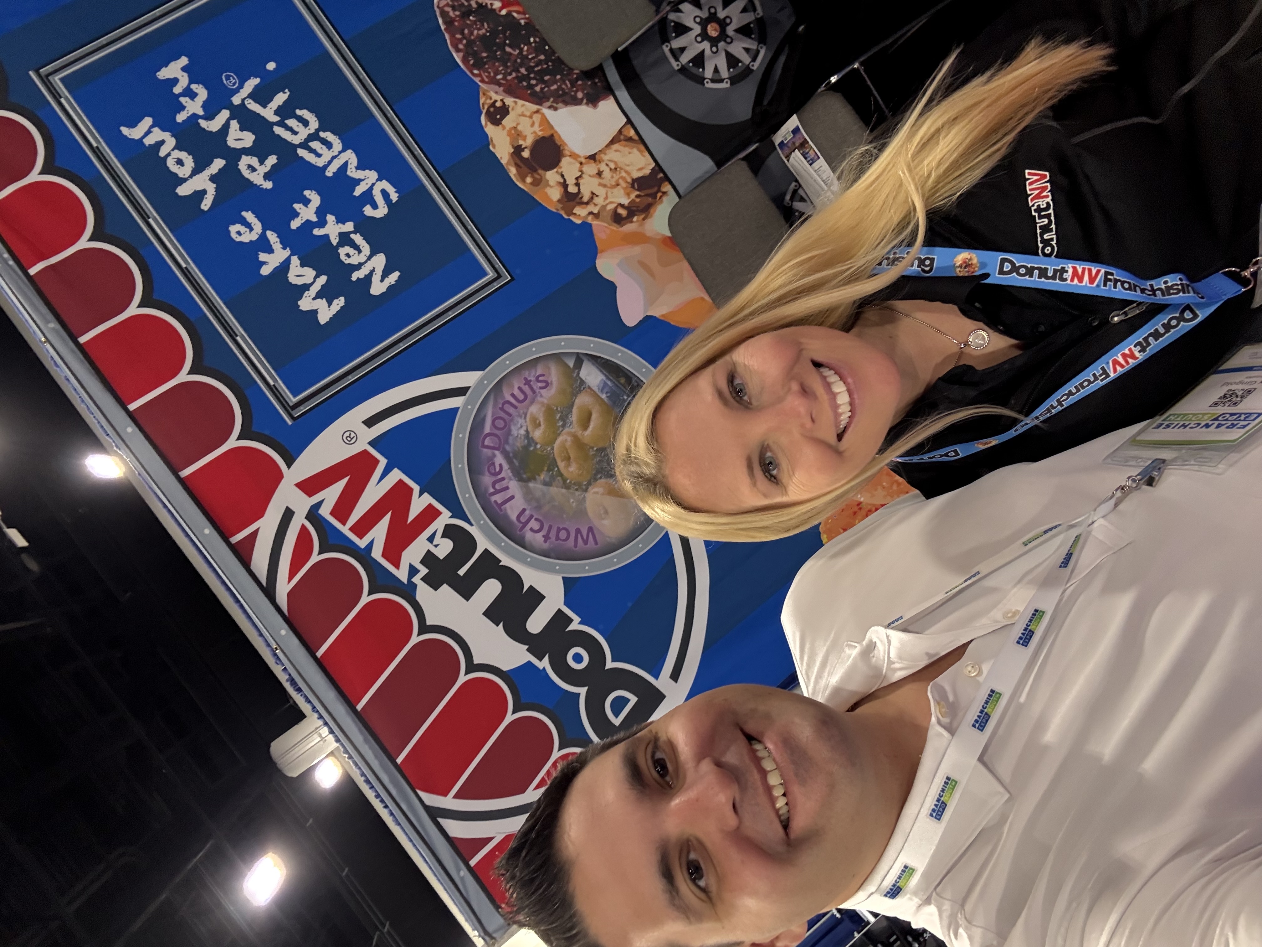 Amanda and Alex Gingold at the DonutNV franchise expo booth